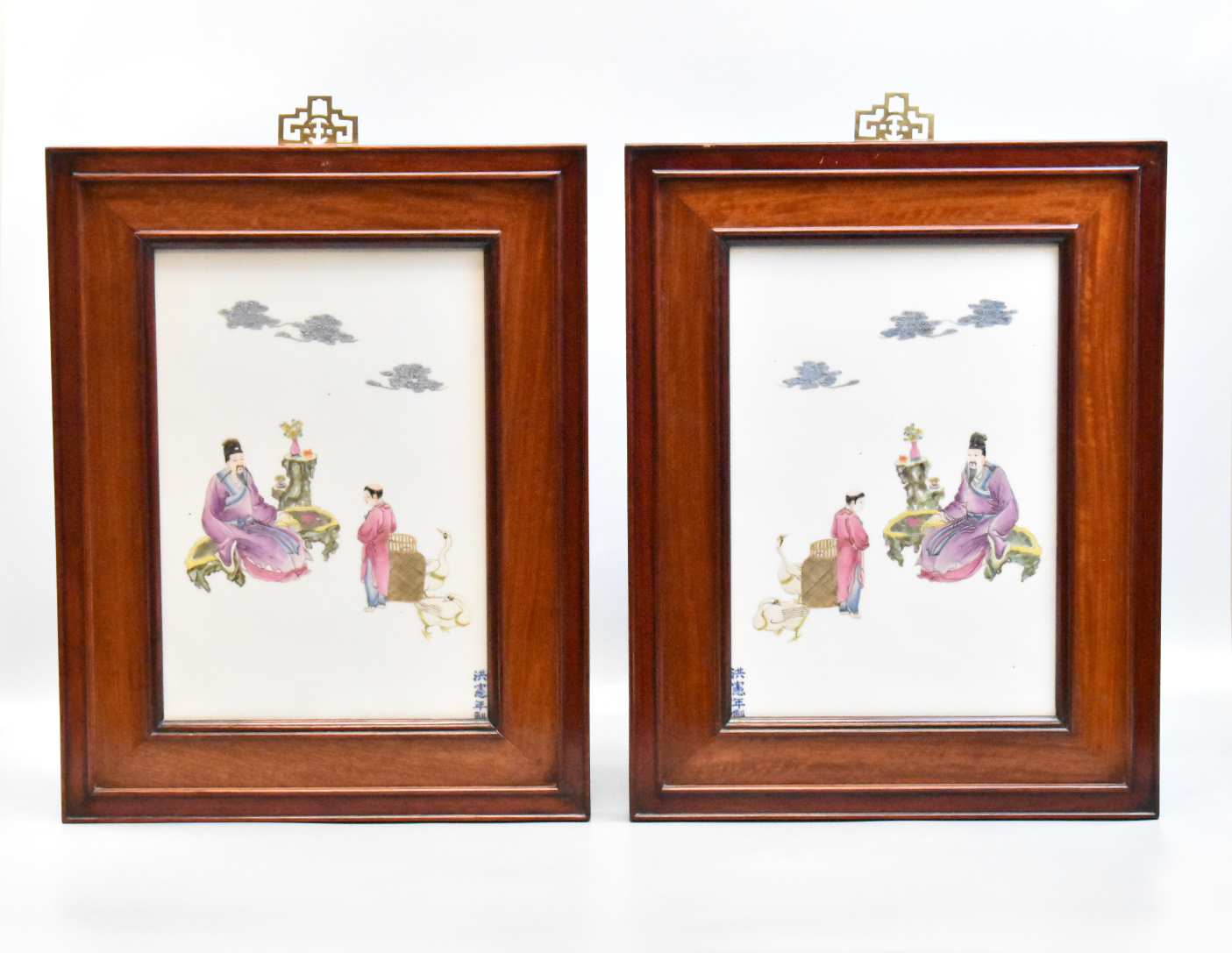 Appraisal: Pair of framed Chinese famille rose porcelain plaque mirror pair