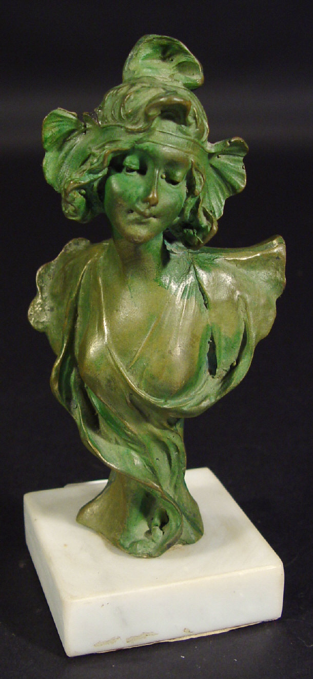 Appraisal: Art Nouveau green patinated bust of a young female on