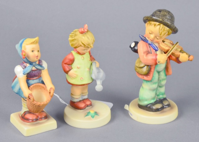 Appraisal: Three Hummel FigurinesTwo are approx H fiddler is H with