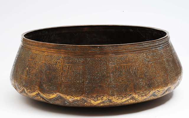 Appraisal: A Persian Mamluk brass bowl th Centurythe interior engraved with