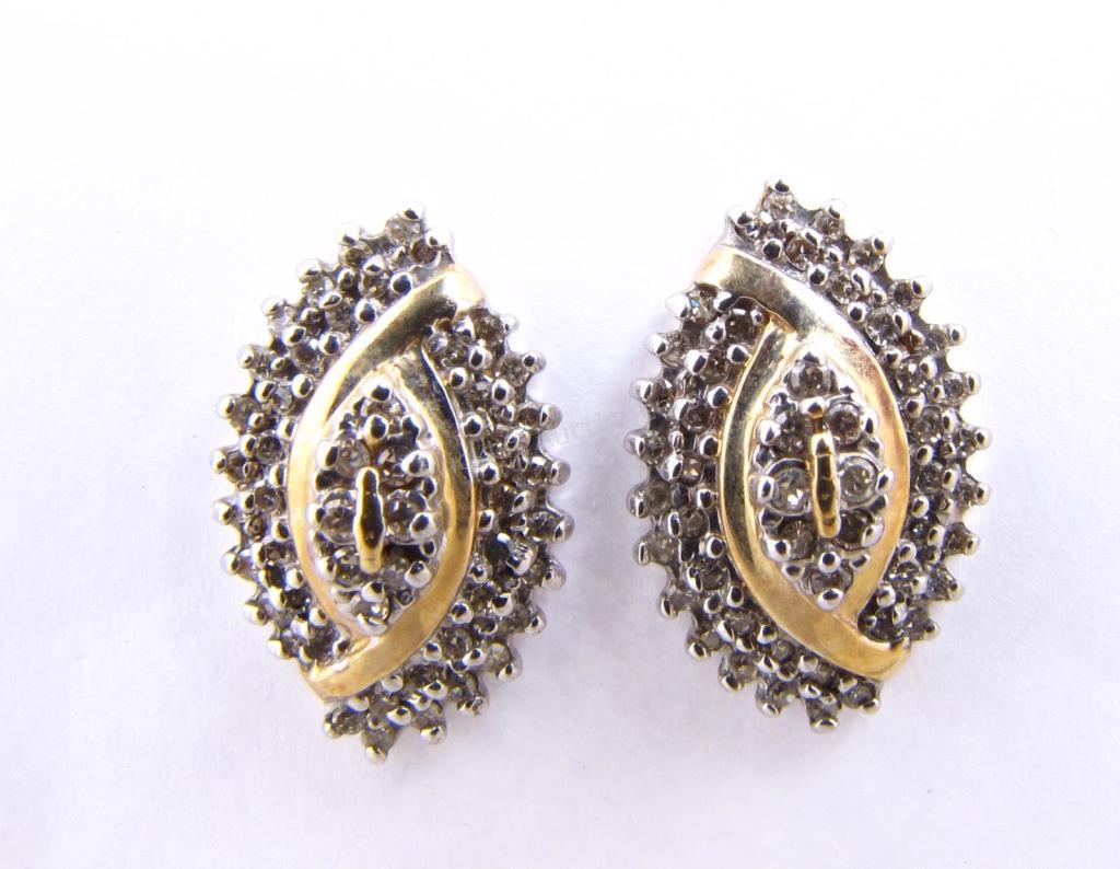 Appraisal: A pair of K white and yellow gold marquis shaped