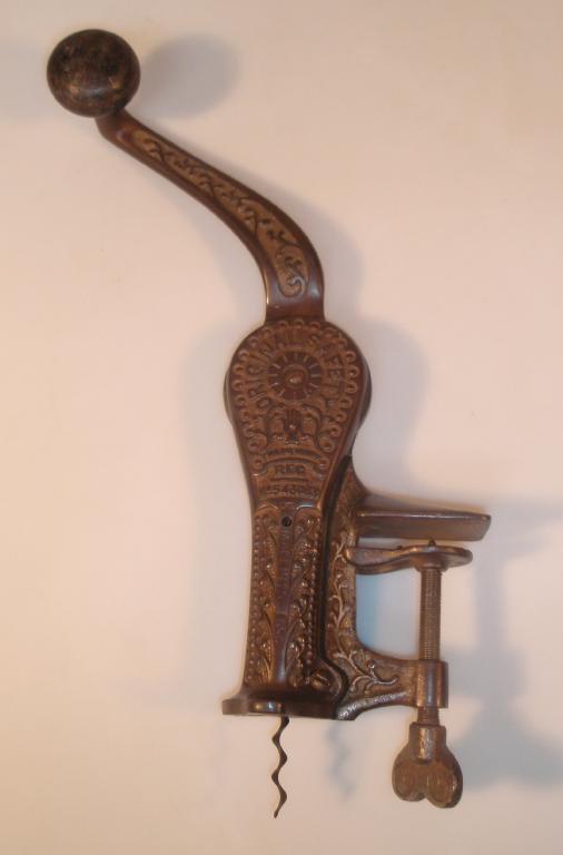 Appraisal: An 'Original Safety Trademark' cast iron bar corkscrew registration no