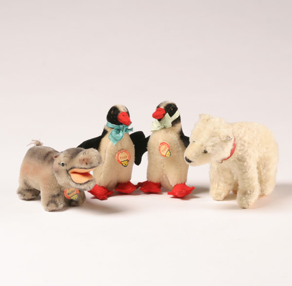 Appraisal: Steiff polar bear Peggy penguins and Mockie hippo ear button