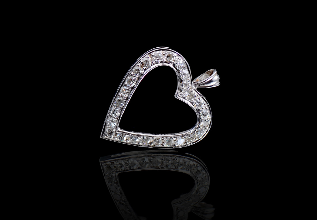 Appraisal: DIAMOND HEART PENDANT K white gold open heart pendant contains