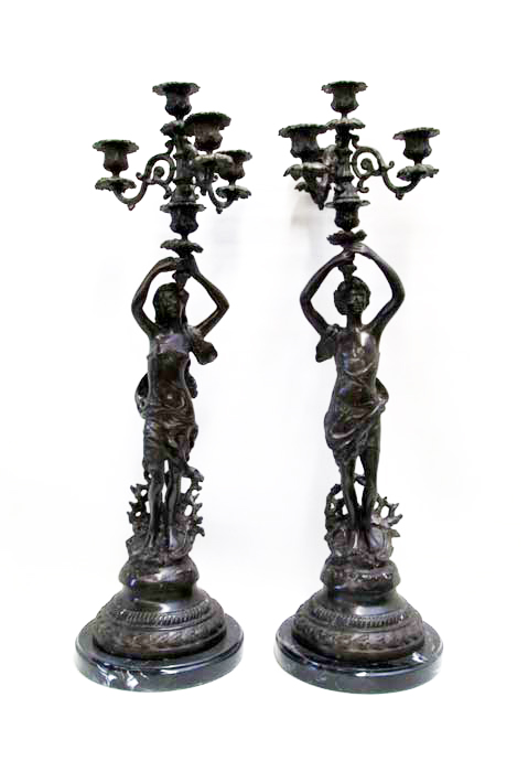 Appraisal: PAIR FIGURAL BRONZE CANDELABRA with standing figures each having four