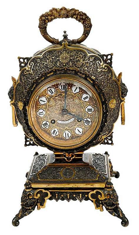 Appraisal: French Chinoiserie Gilt Bronze Table Clock late th century patinated