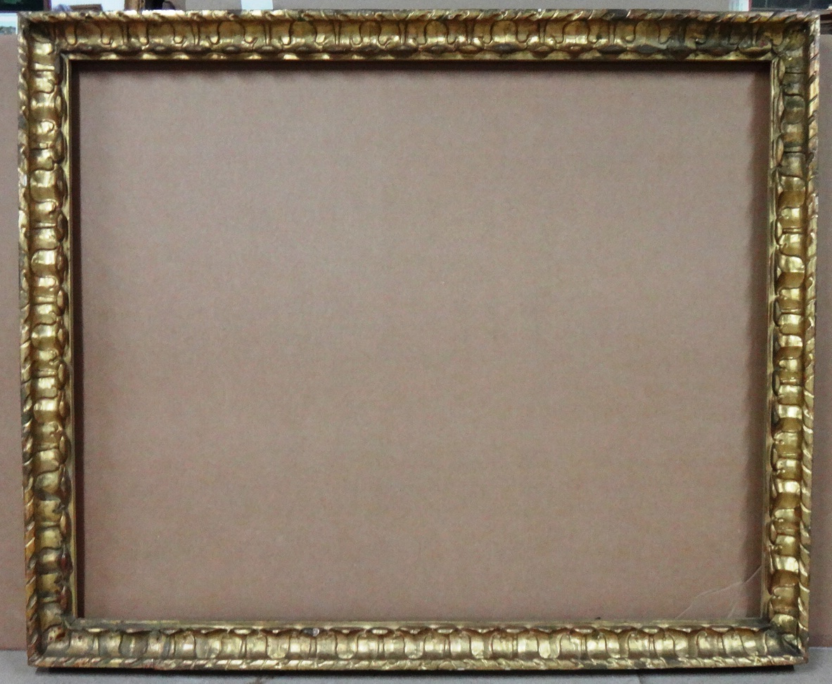 Appraisal: A carved giltwood frame with foliate and ropetwist decoration the