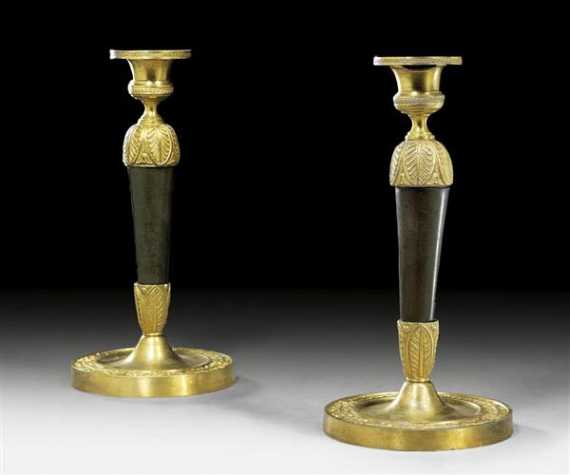 Appraisal: PAIR OF GILT AND BURNISHED BRONZE CANDLE HOLDERS Empire Restauration