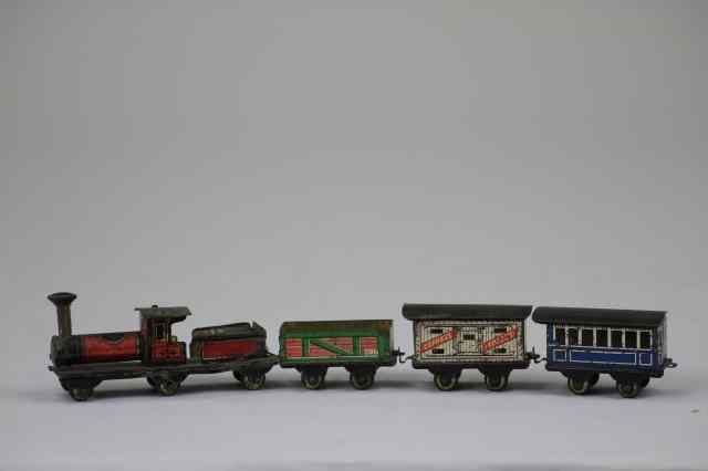 Appraisal: TRAIN SET PENNY TOY Japanese Hess style penny toy in