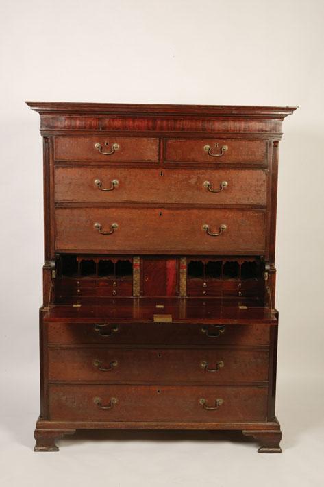 Appraisal: A GEORGE III MAHOGANY SECRETAIRE CHEST ON CHEST the upper