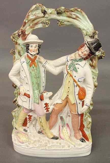 Appraisal: Large th c Staffordshire arbor figural group of two men