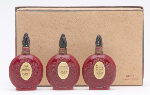 Appraisal: GODET Three-perfume bottle set Cuir de Russie Petite Fleur Bleue