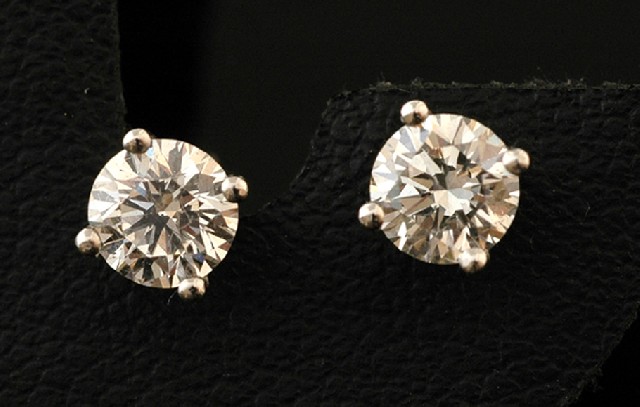 Appraisal: A pair of diamond stud earrings Each round brilliant cut