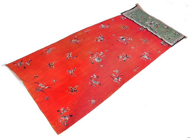 Appraisal: A Chinese red ground silk hanging panel th Centuryembroidered in