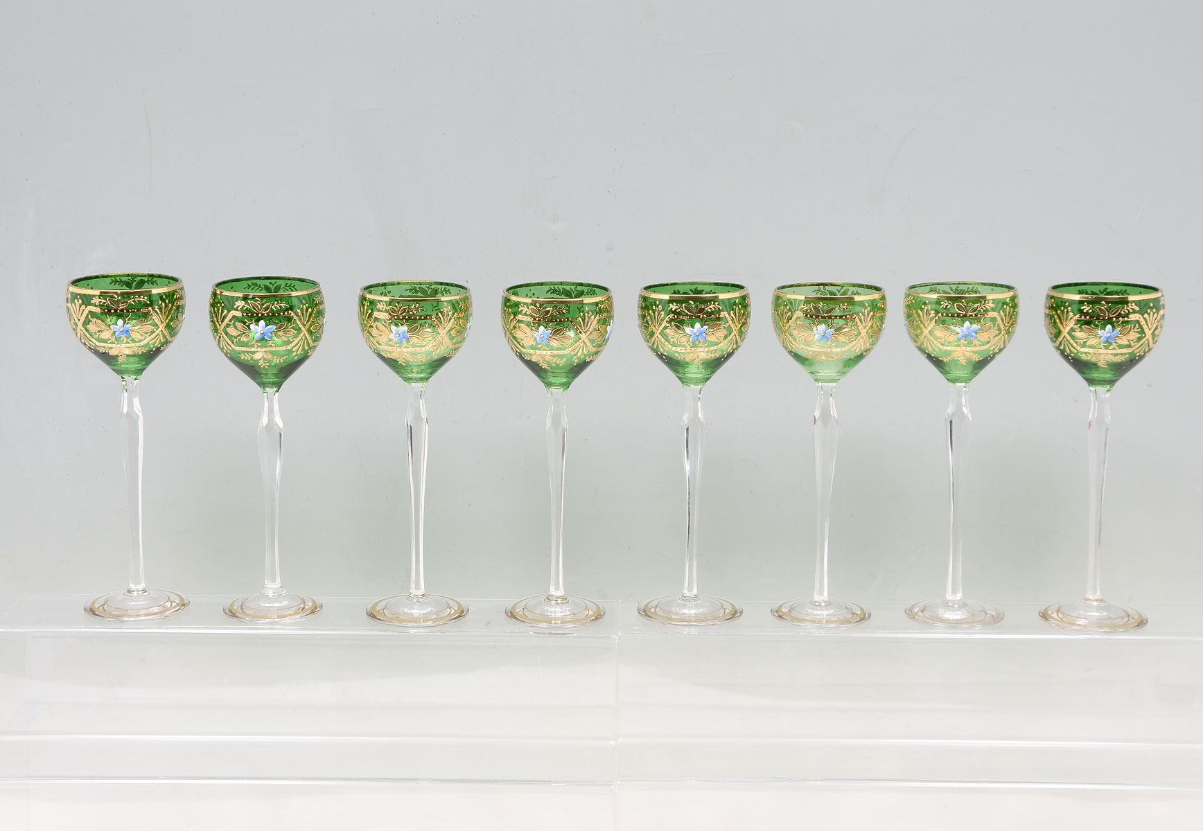 Appraisal: PC GREEN LONG STEM ENAMELED GLASSES long stem goblets having