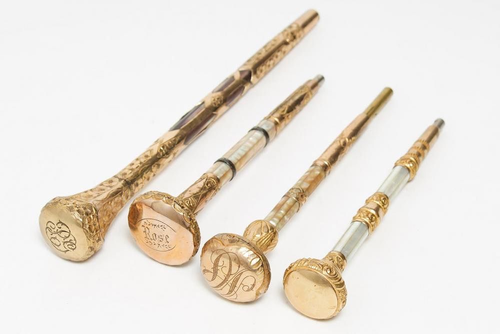 Appraisal: Victorian Gold-Plated Parasol Handles Victorian parasol handles th century gold-plated