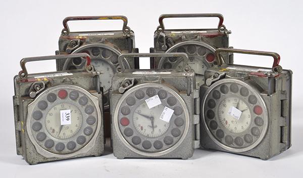 Appraisal: FIVE BELGIAN 'NATURAL ANTWERP JUNIOR' METAL CASED RACING PIGEON CLOCKS