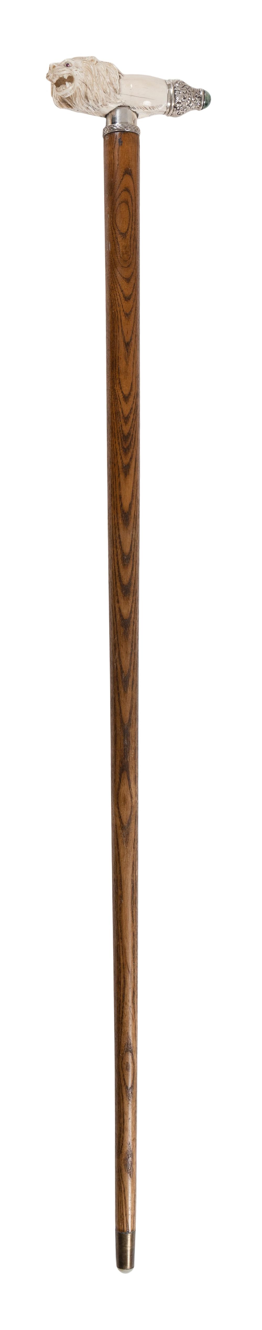 Appraisal: OAK SHAFT WALKING STICK WITH CARVED IVORY LION HANDLE ENGLAND