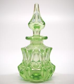 Appraisal: Pattern A mid th century pattern-molded glass perfume bottle with