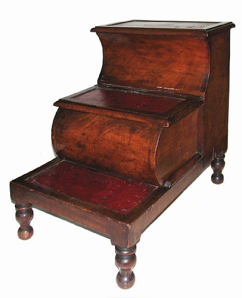 Appraisal: An English Victorian mahogany and red tooled leather top library