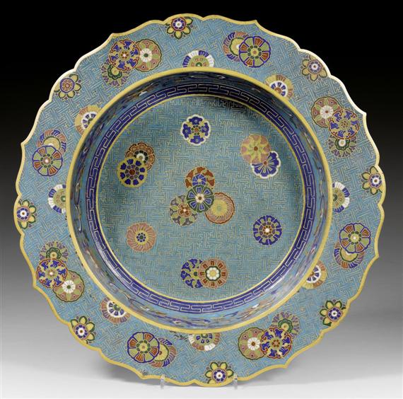 Appraisal: A FINE TURQUOISE GROUND CHAMPLEV BASSIN China th c Diameter