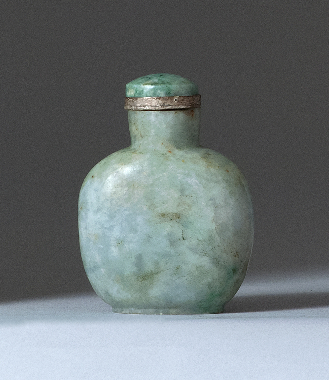 Appraisal: GREEN JADEITE SNUFF BOTTLE Circa In ovoid form Height cm