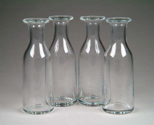 Appraisal: SET OF FOUR BACCARAT DECANTERS In milk bottle form in