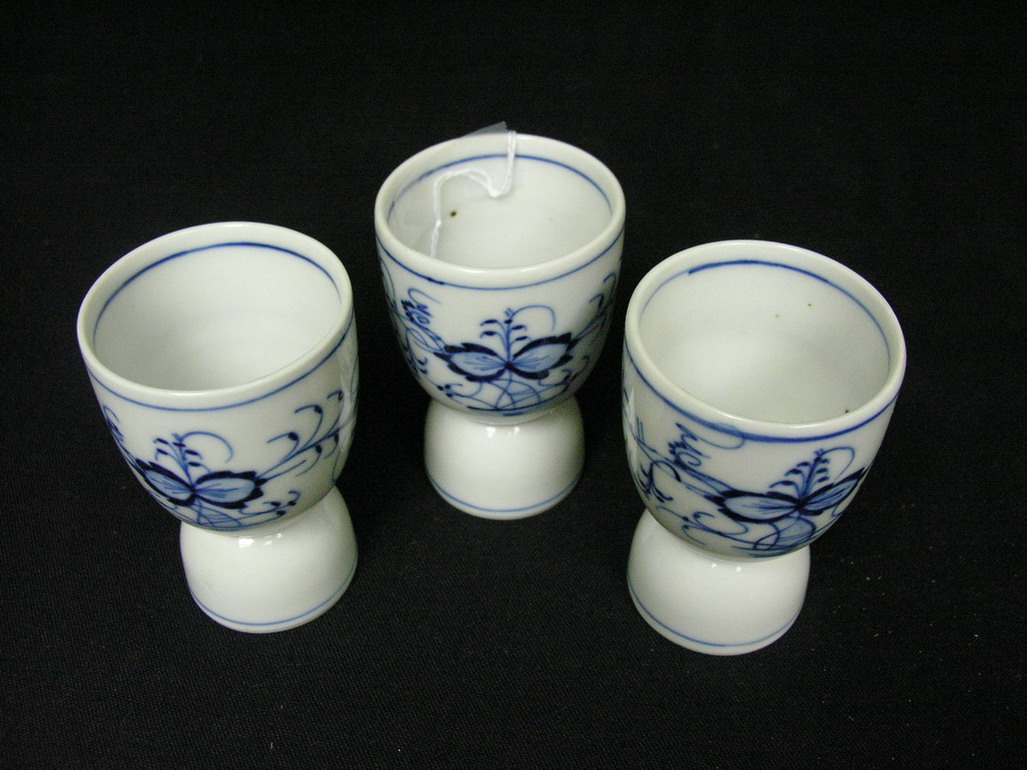 Appraisal: BLUE AND WHITE EGG CUPS Probably German Unmarked Size with