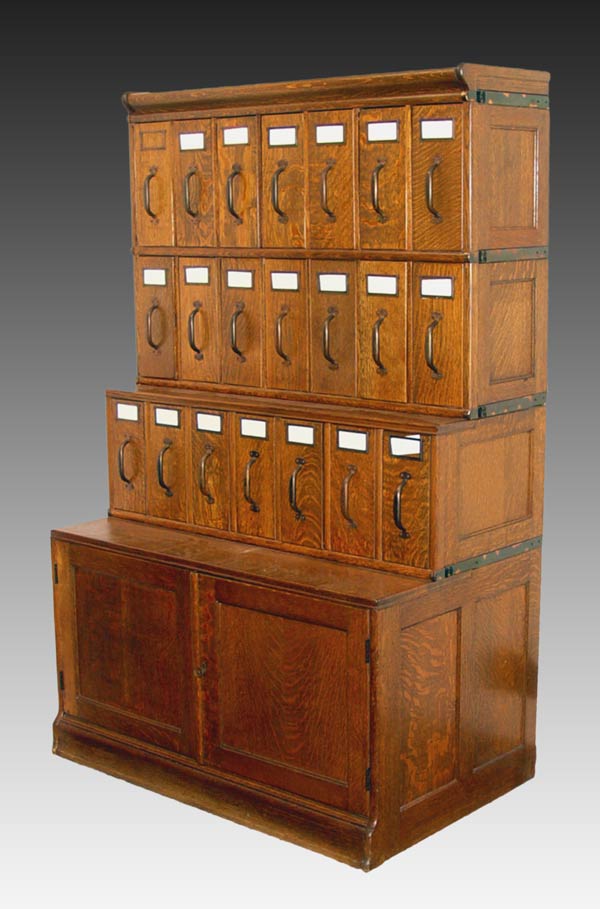 Appraisal: VINTAGE STACK TIGER OAK FILE With vertical files The stacks