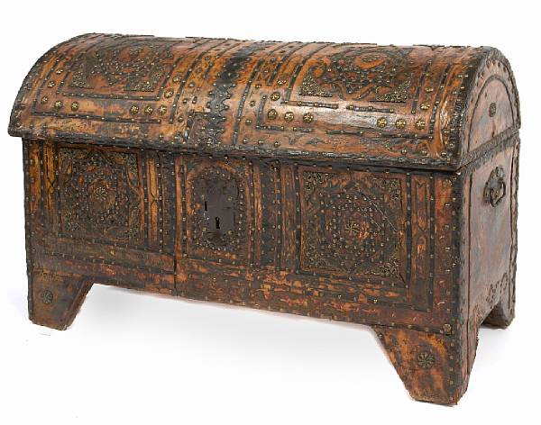 Appraisal: A Spanish brass studded leather trunk height in width in