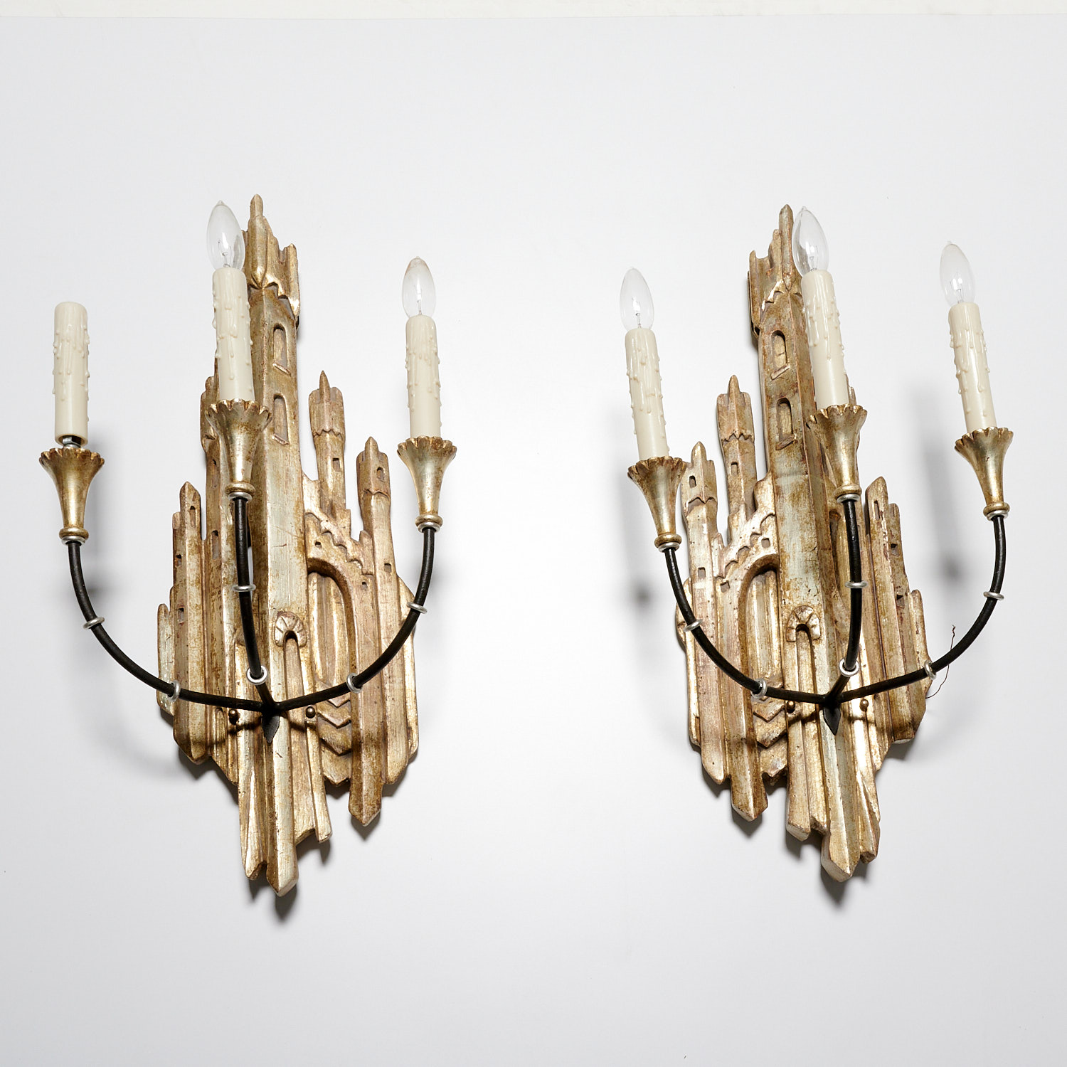 Appraisal: PAIR ITALIAN MODERN GILT AND SILVERED WOOD SCONCES Mid- th