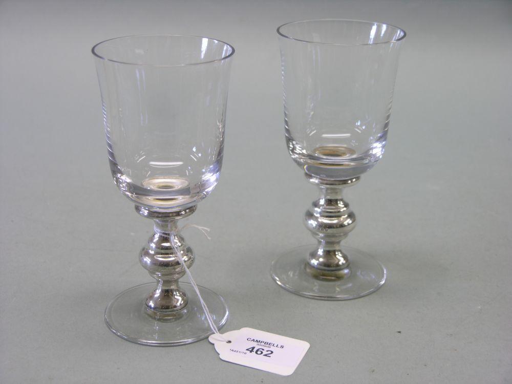 Appraisal: A pair of glass goblets with Britannia Standard silver stems