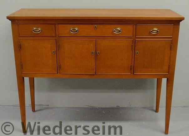 Appraisal: Hepplewhite style mahogany sideboard signed Craftique with shield-form escutcheons h