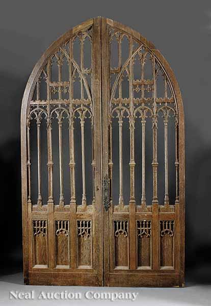 Appraisal: A Pair of Antique Gothic Revival Carved Oak Doors mid-