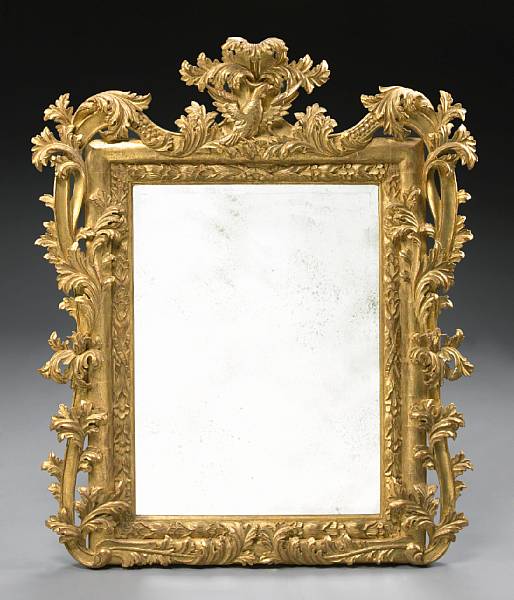 Appraisal: An Italian Neoclassical style giltwood mirror The rectangular plate within