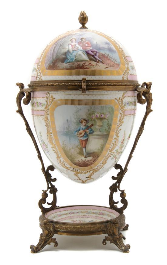 Appraisal: A French Porcelain and Gilt Metal Mounted Urn of ovoid