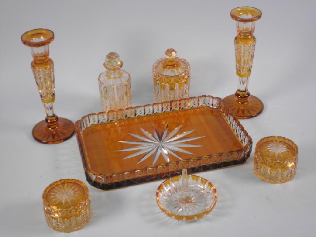 Appraisal: A Bohemian type Amber tinted part cut dressing table comprising