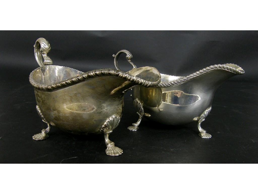 Appraisal: Two s Georgian style silver graduated sauceboats the gadrooned rims