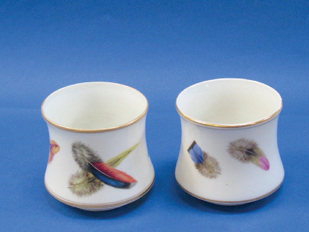 Appraisal: A PAIR OF ROYAL WORCESTER SPOOL-SHAPED VASES the cream ground