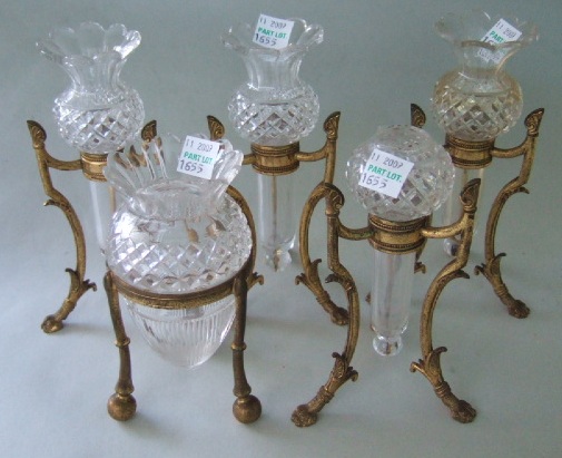 Appraisal: A set of four cut glass bud vases on gilt