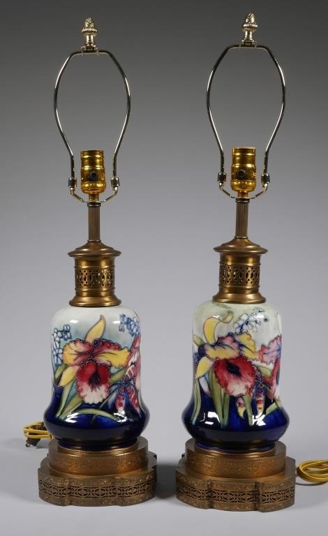 Appraisal: Matched pair of glazed Moorcroft flower lamps Circa early th