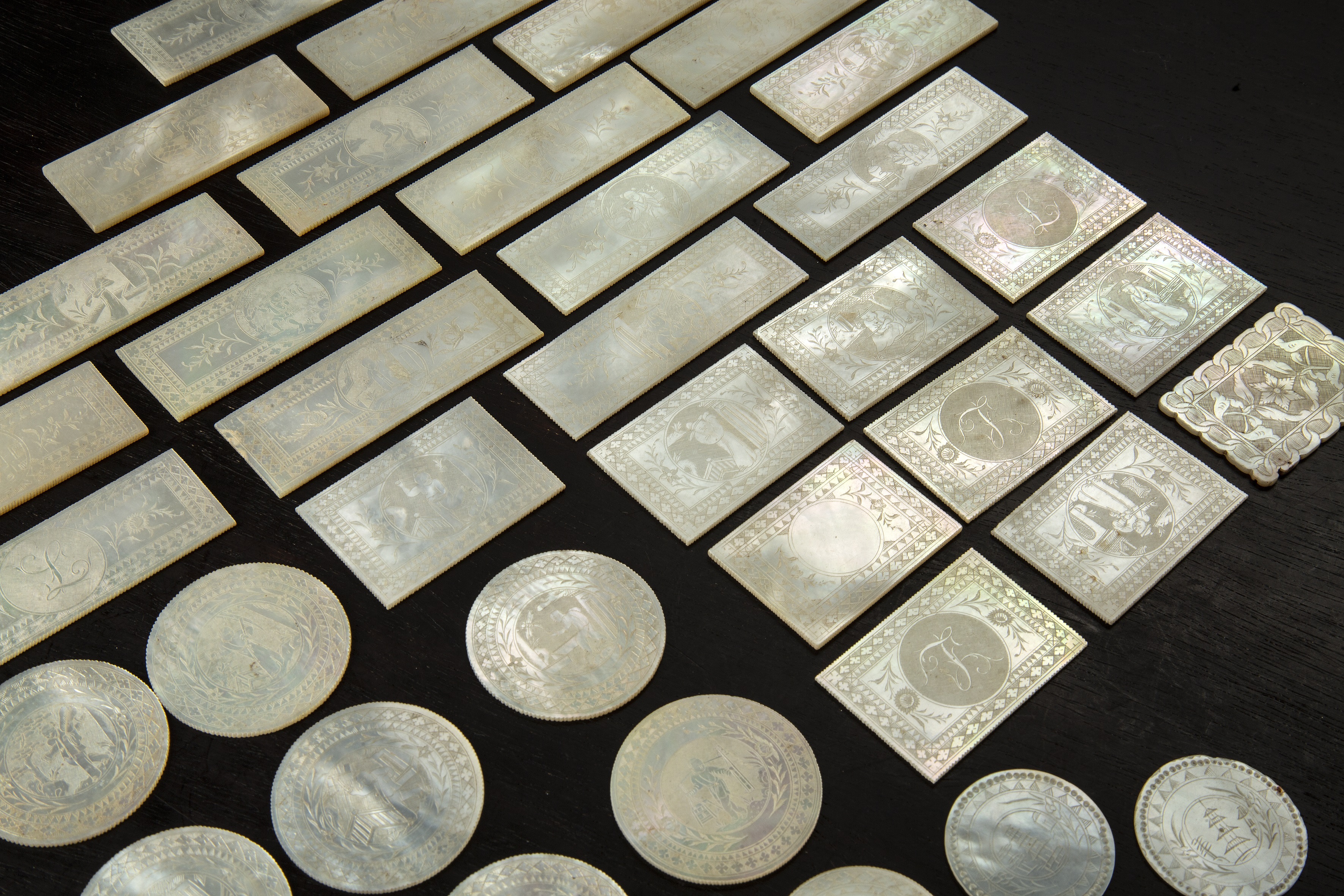 Appraisal: Collection of mother-of-pearl gaming tokens Late th early th Century