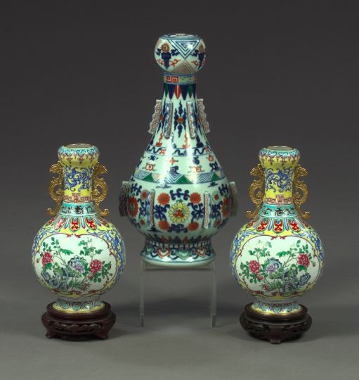 Appraisal: Pair of Kuang Hsu Elaborately Enameled and Parcel-Gilt Two-Handled Vases