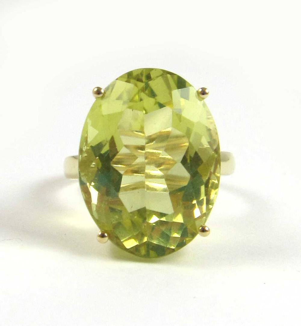 Appraisal: LEMON CITRINE SOLITAIRE RING Oval-cut transparent yellow citrine - cts