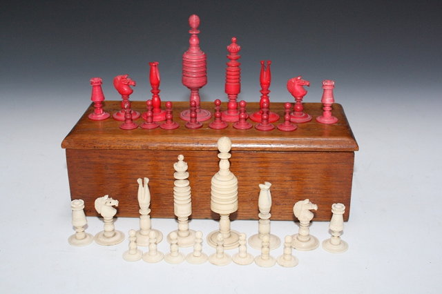 Appraisal: A TURNED AND STAINED BONE CHESS SET cm high with