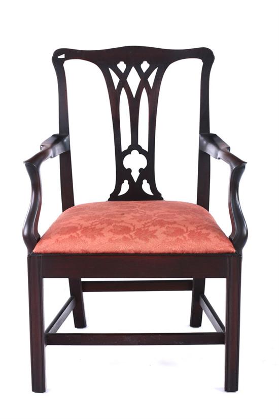 Appraisal: AMERICAN CHIPPENDALE MAHOGANY ARMCHAIR th century Pierced vasi-form splat over