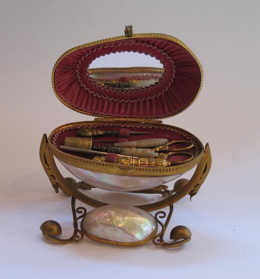 Appraisal: A TH CENTURY BOHEMIAN RUBY GLASS PEDESTAL with a castellated