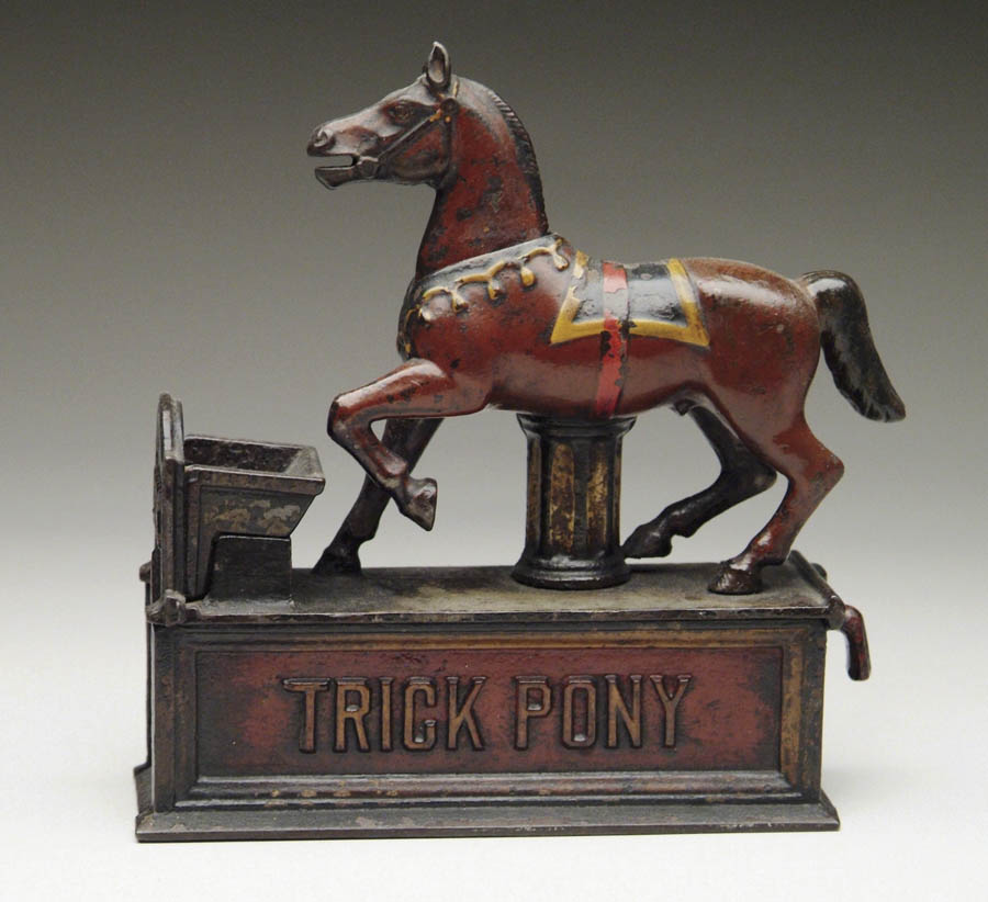 Appraisal: TRICK PONY MECHANICAL BANK Place a coin in pony's mouth