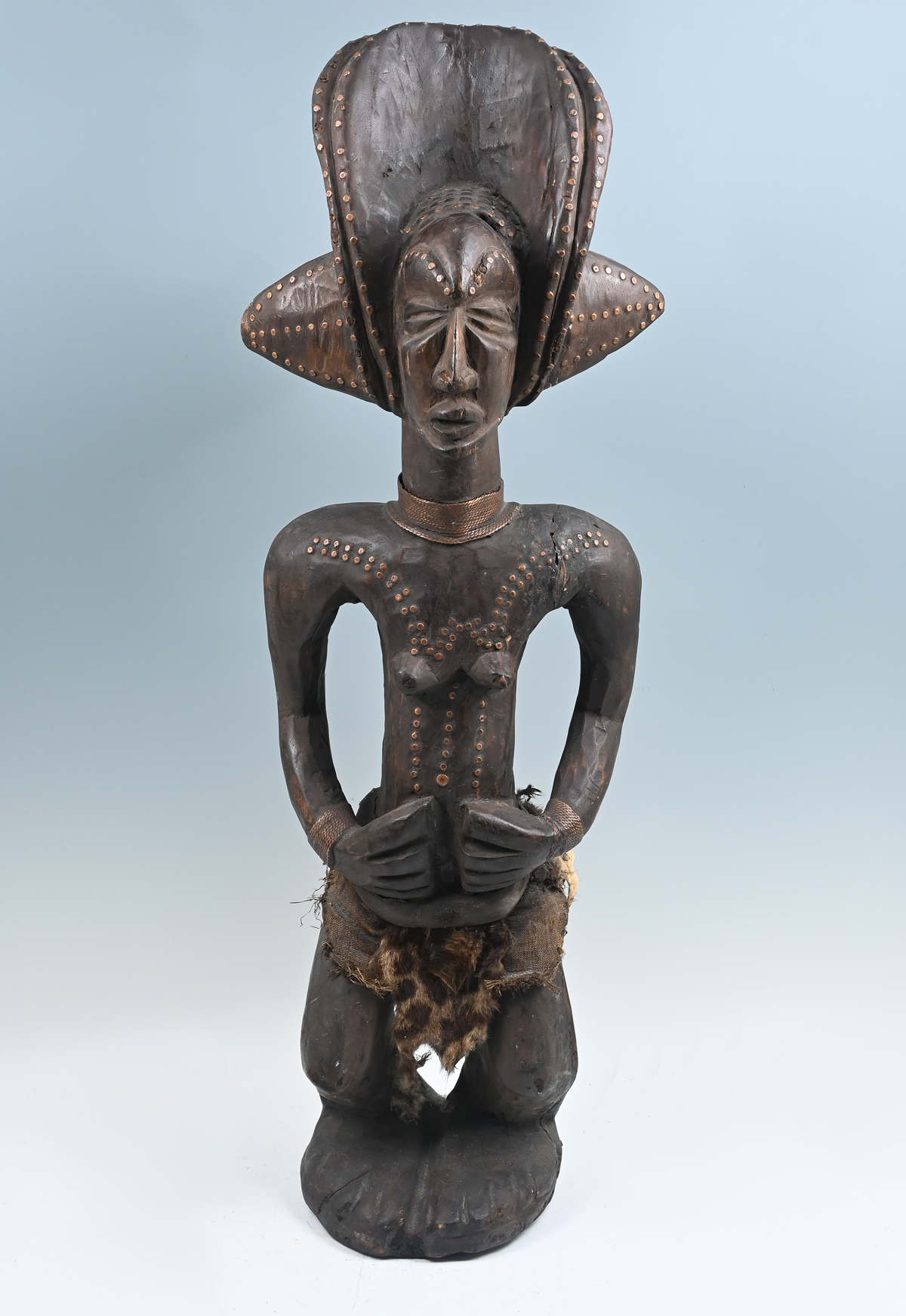 Appraisal: FEMALE CHOKWE SCULPTURE The Chokwes are well known for sculptures