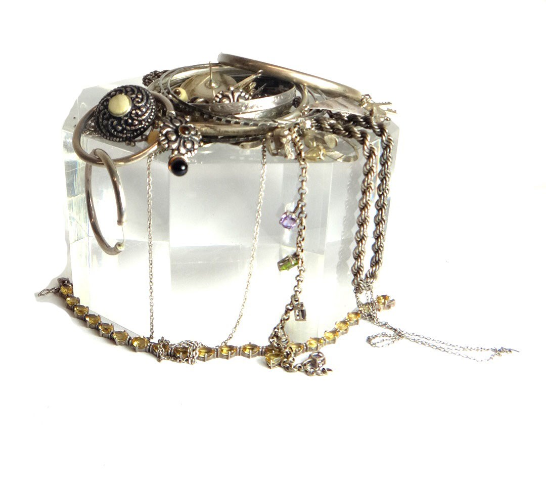 Appraisal: Mostly silver jewellery comprising a charm bracelet two gem set